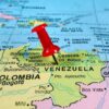 Red pin on Venezuela, South America map.