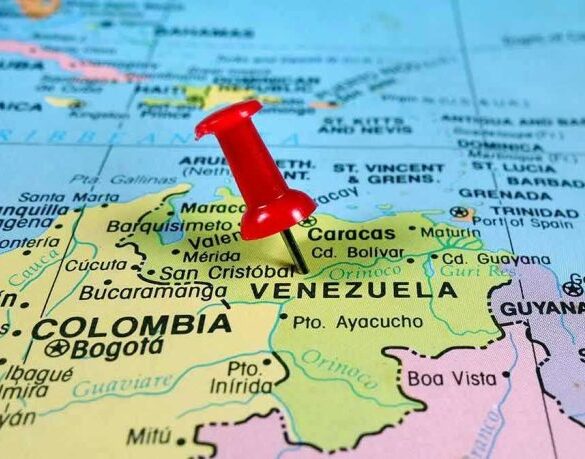 Red pin on Venezuela, South America map.
