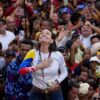 Venezuelan opposition leader Maria Corina Machado addresses supporters at a protest.