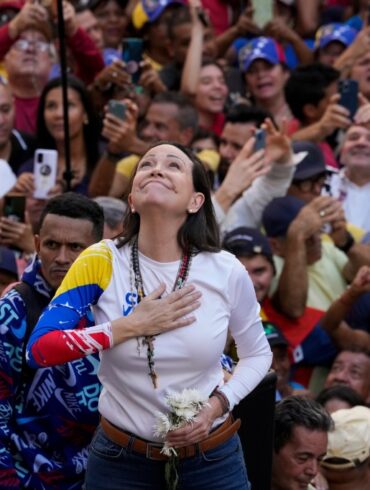 Venezuelan opposition leader Maria Corina Machado addresses supporters at a protest.