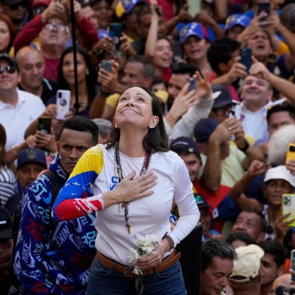 Venezuelan opposition leader Maria Corina Machado addresses supporters at a protest.