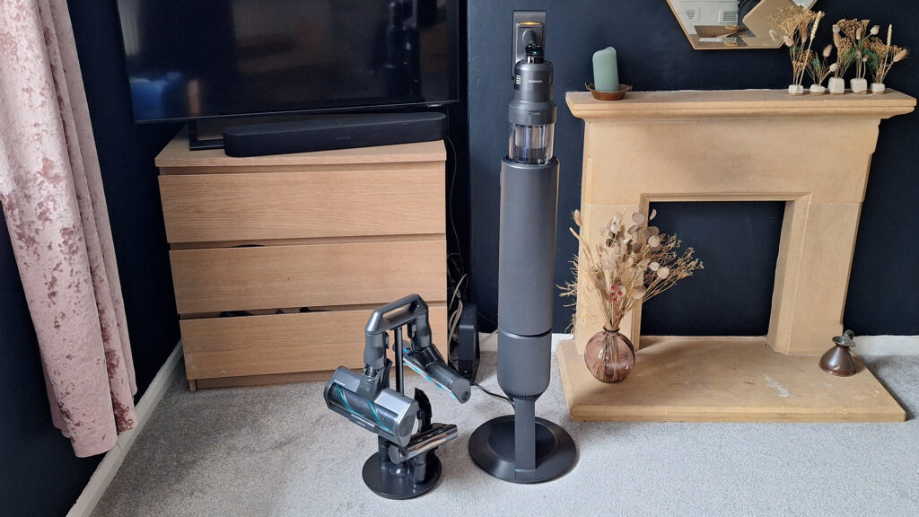 Samsung Bespoke AI Jet Ultra vacuum in its dock, with detail tool holder on the floor next to it