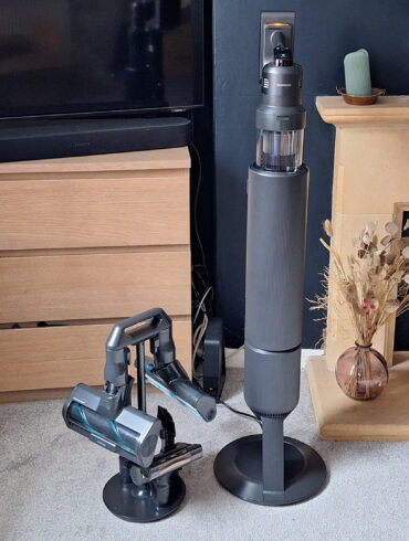 Samsung Bespoke AI Jet Ultra vacuum in its dock, with detail tool holder on the floor next to it
