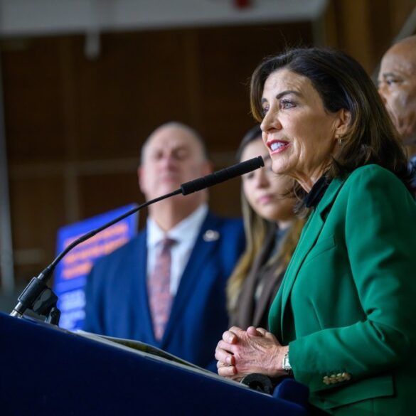 Governor Kathy Hochul speaking at a podium during the SPARC Kips Bay groundbreaking.