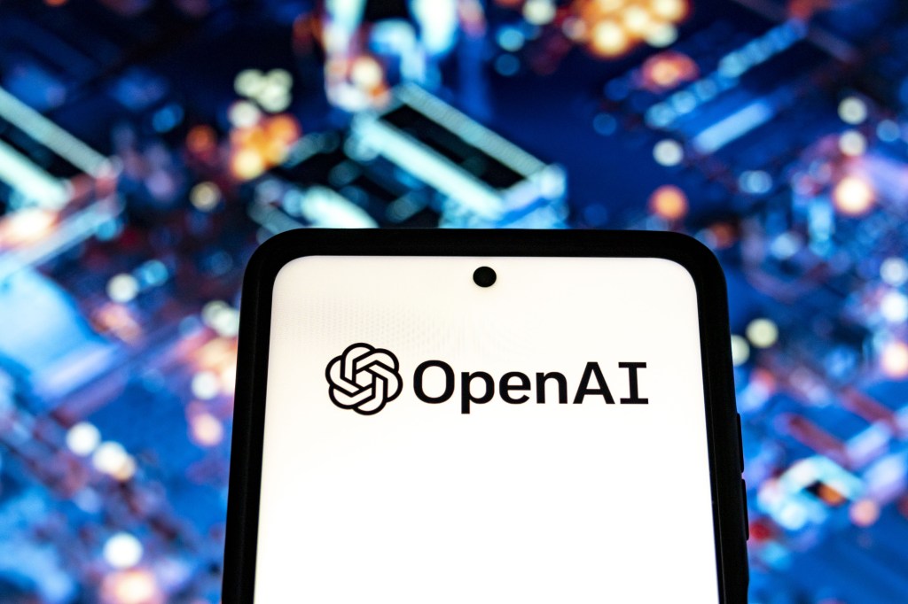The OpenAI logo is displayed on a smartphone as the company’s stock-based compensation reaches levels unmatched by any major tech startup before an IPO.