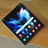 The Samsung Galaxy Z Fold 3 opened out, face up on a table