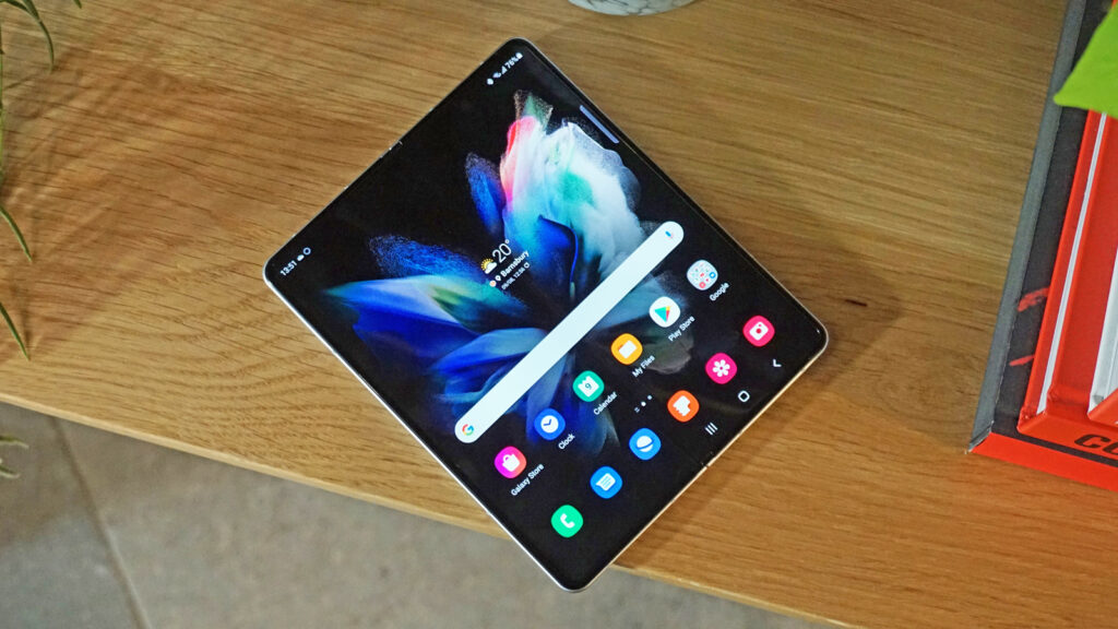 The Samsung Galaxy Z Fold 3 opened out, face up on a table