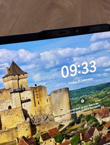 Acer Aspire 14 AI laptop display showing the Windows 11 login screen