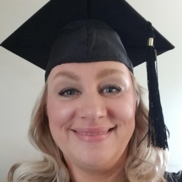 "This photo is from my hooding ceremony when I received my first masters degree in my 40s."