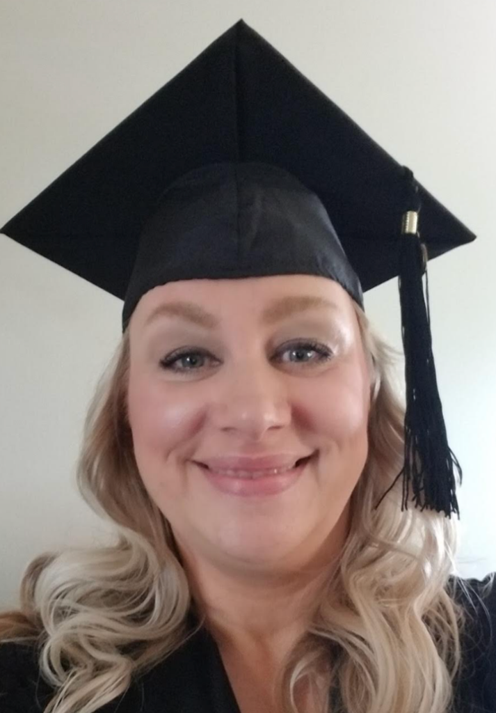 "This photo is from my hooding ceremony when I received my first masters degree in my 40s."