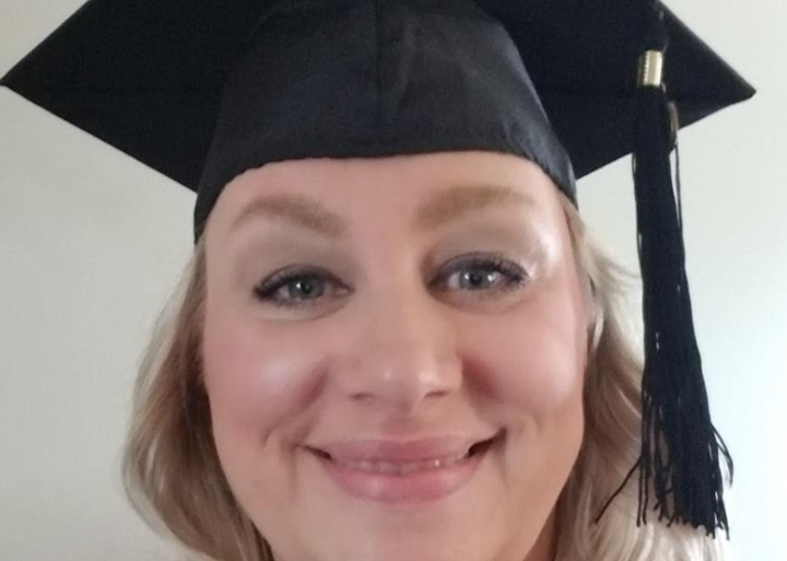 "This photo is from my hooding ceremony when I received my first masters degree in my 40s."