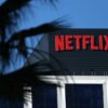 The Netflix logo is pictured at the company's Hollywood studio offices at Sunset Bronson Studios in Los Angeles, California on December 5, 2025. (Photo by Patrick T. Fallon / AFP via Getty Images)