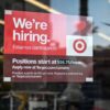 A sign advertising for new employees with an updated starting salary of USD $16.75 per hour is seen in the window of a Target store in Hollywood, California on November 9, 2021. - Even as millions of Americans who lost their jobs to the Covid-19 pandemic have returned to work, companies nationwide report they're still struggling to hire employees in recent months. More than 10 million jobs were unfilled as of the end of August, according to government data. (Photo by Robyn Beck / AFP) (Photo by ROBYN BECK/AFP via Getty Images)