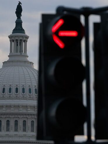 WASHINGTON, DC - JANUARY 05: Traffic lights point the way near the U.S. Capitol on January 05, 2026 in Washington, DC. Members of Congress are set to return to the capital Monday following a two-and-a-half week break for the holidays. (Photo by Chip Somodevilla/Getty Images)