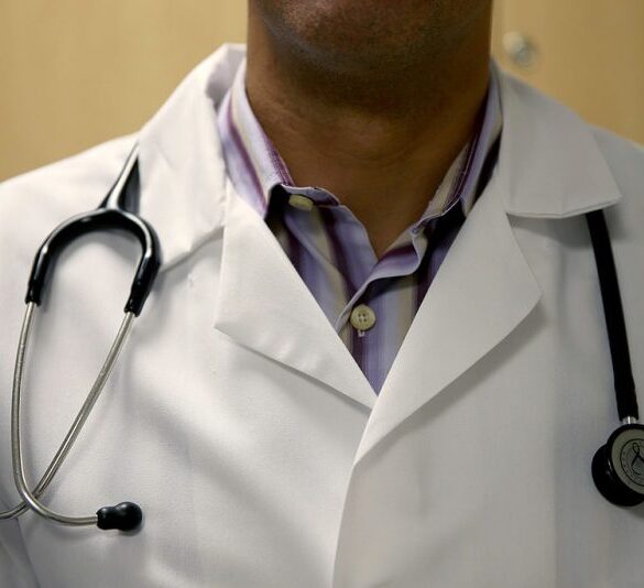 MIAMI, FL - JUNE 02: A doctor wears a stethoscope as he see a patient for a measles vaccination during a visit to the Miami Children's Hospital on June 02, 2014 in Miami, Florida. The Centers for Disease Control and Prevention last week announced that in the United States they are seeing the most measles cases in 20 years as they warned clinicians, parents and others to watch for and get vaccinated against the potentially deadly virus. (Photo by Joe Raedle/Getty Images)
