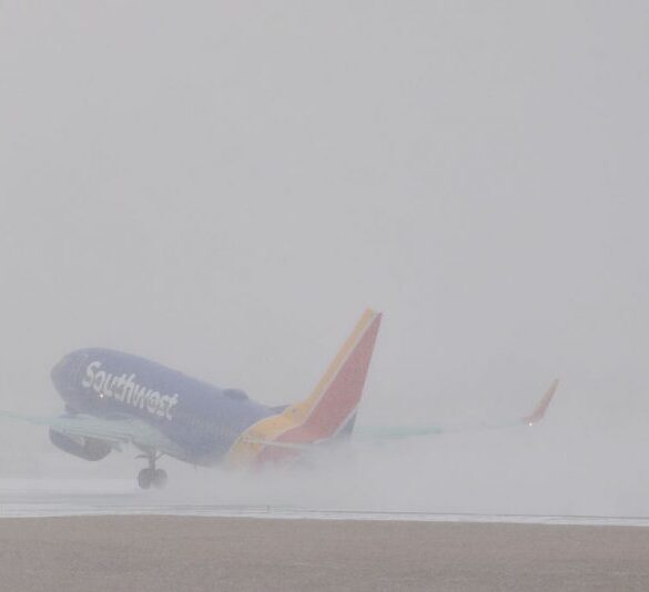 NASHVILLE, TENNESSEE - JANUARY 24: A southwest flight takes off at Nasvhille International Airport as snow falls on January 24, 2026 in Nashville, Tennessee. A massive winter storm is expected to bring frigid temperatures, ice, and snow to millions of Americans across the nation. (Photo by Brett Carlsen/Getty Images)