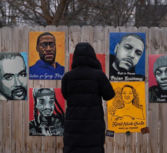 MINNEAPOLIS, MINNESOTA - JANUARY 15: A poster featuring the likeness of Renee Good hangs alongside pictures of other homicide victims near a memorial to Good on January 15, 2026 in Minneapolis, Minnesota. Protests have sparked up around the area following the fatal shooting of Renee Good by an immigration enforcement agent during an incident in south Minneapolis on January 7. (Photo by Scott Olson/Getty Images)