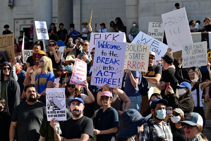 People partake in a "National Shutdown" protest against US Immigration and Customs Enforcement (ICE) in Los Angeles on January 30, 2026. Donald Trump's border chief said January 29, 2026 that some federal agents could be withdrawn from Minneapolis, the northern US city that has become the flashpoint for the president's immigration crackdown. The Trump administration, facing a public backlash over the shooting deaths of two Americans by federal agents in Minneapolis, also eased immigration operations in the northeastern state of Maine. (Photo by Frederic J. Brown / AFP via Getty Images)