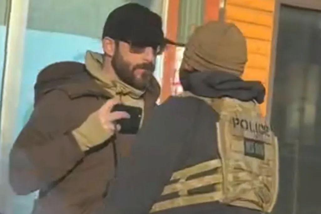 Alex Pretti confronting a federal agent in Minneapolis before he was fatally shot.