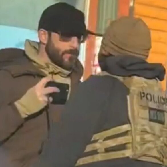 Alex Pretti confronting a federal agent in Minneapolis before he was fatally shot.