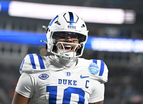 Politics: duke sues its quarterback in bid to keep him