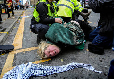 FILE PHOTO. A Palestine Action activist is arrested by police officers in Manchester, UK, November 22, 2023.