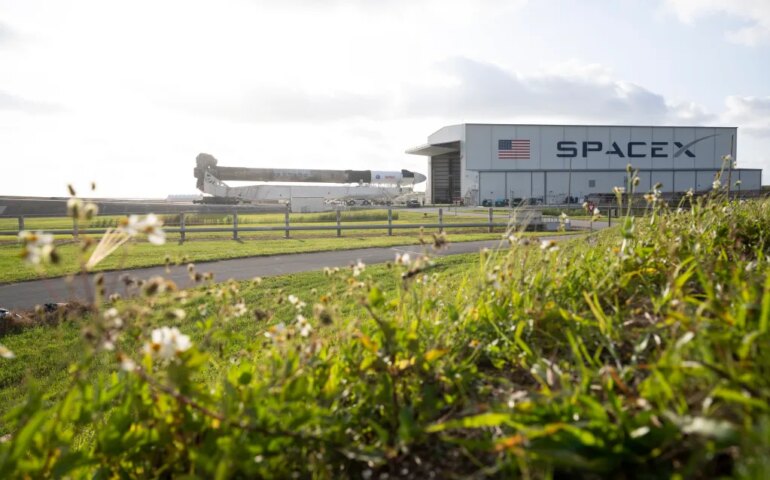 SpaceX Falcon 9 rocket and Crew Dragon spacecraft being rolled out to Launch Complex 39A.