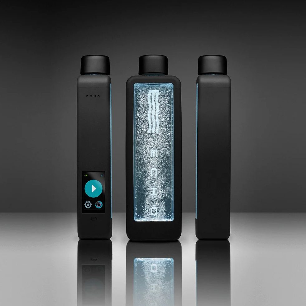Three black Echo smart water bottles, showing the front, side, and back views.