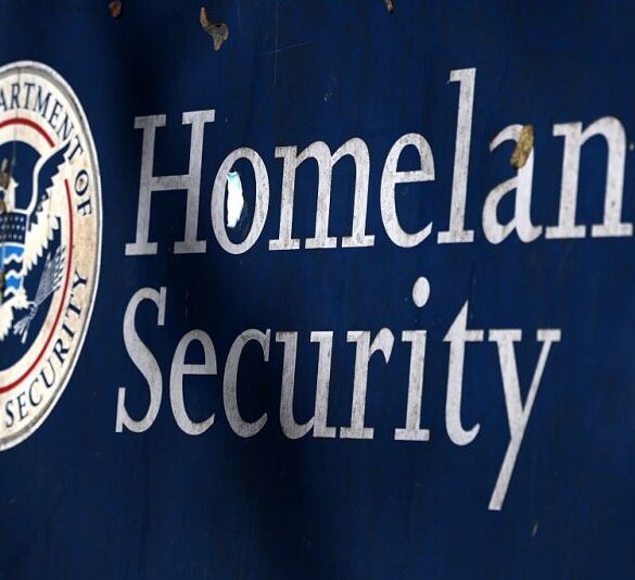 WASHINGTON, DC - FEBRUARY 13: The sign of Department of Homeland Security is seen outside its headquarters on February 13, 2026 in Washington, DC. Much of the Department of Homeland Security is set to shut down starting today after the Congress failed to pass a long-term funding bill. (Photo by Alex Wong/Getty Images)