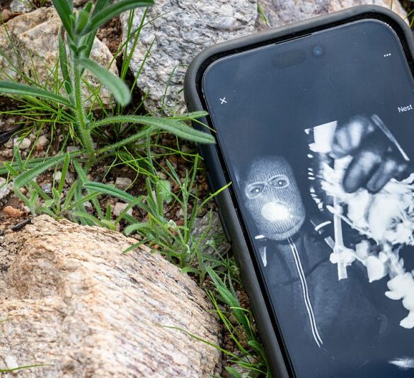 TUCSON, ARIZONA - FEBRUARY 10: In this photo illustration, Nancy Guthrie's alleged kidnapper is seen on FBI Director Kash Patel's X account on a cellular phone February 10, 2026 in Tucson, Arizona. Searches continues for Nancy Guthrie, the 84-year-old mother of U.S. journalist and television host Savannah Guthrie, after she went missing from her home on the morning of February 1st. Guthrie's possible abductors had set a deadline of 5pm on February 9 for a $6 million payment. (Photo by Brandon Bell/Getty Images)