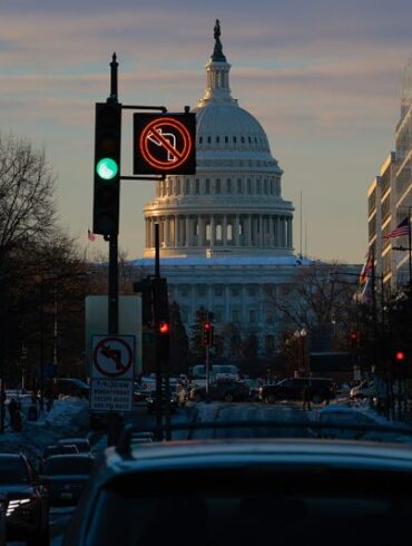 WASHINGTON, DC - JANUARY 29: Morning traffic navigates snowy roads near the U.S. Capitol on January 29, 2026 in Washington, DC. A partial federal government shutdown looms as Senate Democrats have threatened to hold up funding for the Department of Homeland Security after two U.S. citizens were murdered by Immigration and Customs Enforcement agents in Minneapolis. (Photo by Chip Somodevilla/Getty Images)