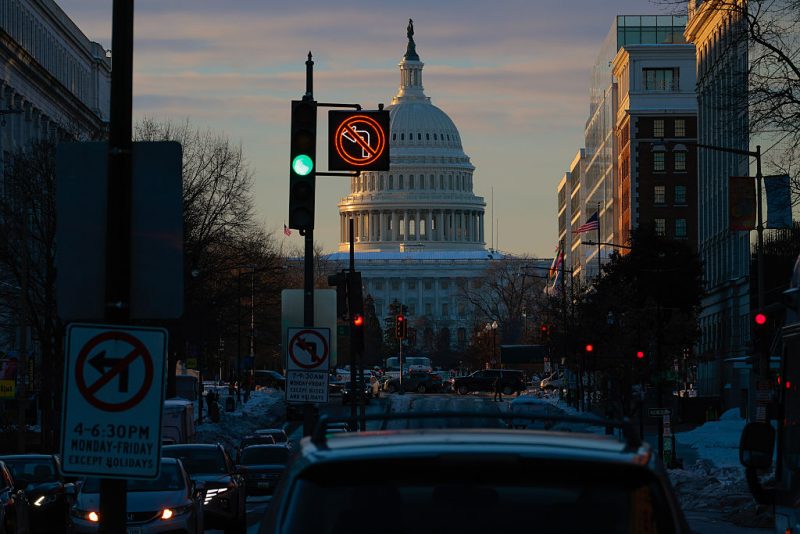 WASHINGTON, DC - JANUARY 29: Morning traffic navigates snowy roads near the U.S. Capitol on January 29, 2026 in Washington, DC. A partial federal government shutdown looms as Senate Democrats have threatened to hold up funding for the Department of Homeland Security after two U.S. citizens were murdered by Immigration and Customs Enforcement agents in Minneapolis. (Photo by Chip Somodevilla/Getty Images)