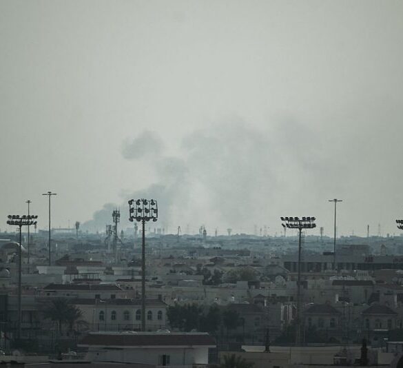 Smoke rises from an area in the direction of Al Udeid Air Base, which houses the Qatar Emiri Air Force and foreign forces including the US, in Doha on February 28, 2026, following a reported Iranian strike. The United States and Israel launched strikes against Iran on February 28, with Israel's public broadcaster reporting that supreme leader Ayatollah Ali Khamenei had been targeted, as the Islamic republic retaliated with barrages of missiles at Gulf states and Israel. (Photo by Mahmud HAMS / AFP via Getty Images)