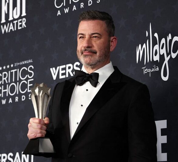 TV host Jimmy Kimmel poses in the press room with the Best Talk Show award for "Jimmy Kimmel Live!" during the 31st Annual Critics Choice Awards at Barker Hangar in Santa Monica, California, on January 4, 2026. (Photo by Michael Tran / AFP via Getty Images)