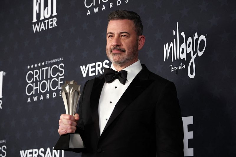TV host Jimmy Kimmel poses in the press room with the Best Talk Show award for "Jimmy Kimmel Live!" during the 31st Annual Critics Choice Awards at Barker Hangar in Santa Monica, California, on January 4, 2026. (Photo by Michael Tran / AFP via Getty Images)