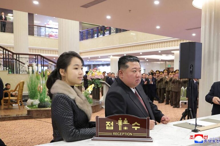 TOPSHOT - This picture taken on December 20, 2025 and released by North Korea's official Korean Central News Agency (KCNA) via KNS on December 23, 2025 shows North Korean leader Kim Jong Un (R) and his daughter Ju Ae (L) inspecting the Milyong Hotel, which was recently completed in the Samjiyon tourist district of Ryanggang Province. (Photo by KCNA VIA KNS / AFP via Getty Images) / South Korea OUT / ---EDITORS NOTE--- RESTRICTED TO EDITORIAL USE - MANDATORY CREDIT "AFP PHOTO/KCNA VIA KNS" - NO MARKETING NO ADVERTISING CAMPAIGNS - DISTRIBUTED AS A SERVICE TO CLIENTS THIS PICTURE WAS MADE AVAILABLE BY A THIRD PARTY. AFP CAN NOT INDEPENDENTLY VERIFY THE AUTHENTICITY, LOCATION, DATE AND CONTENT OF THIS IMAGE. /