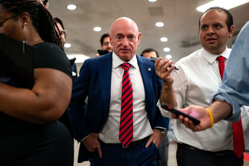 WASHINGTON, DC - JULY 25: U.S. Sen. Mark Kelly (D-AZ) speaks with reporters while waiting to catch the Senate subway to the Hart Senate Office Building from the U.S. Capitol on July 25, 2024 in Washington, DC. Multiple news outlets are reporting that the Senator from Arizona and former astronaut is one of many candidates being vetted to be the Vice Presidential running mate to Kamala Harris. (Photo by Kent Nishimura/Getty Images)