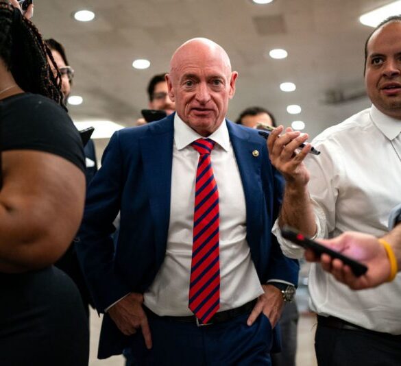 WASHINGTON, DC - JULY 25: U.S. Sen. Mark Kelly (D-AZ) speaks with reporters while waiting to catch the Senate subway to the Hart Senate Office Building from the U.S. Capitol on July 25, 2024 in Washington, DC. Multiple news outlets are reporting that the Senator from Arizona and former astronaut is one of many candidates being vetted to be the Vice Presidential running mate to Kamala Harris. (Photo by Kent Nishimura/Getty Images)
