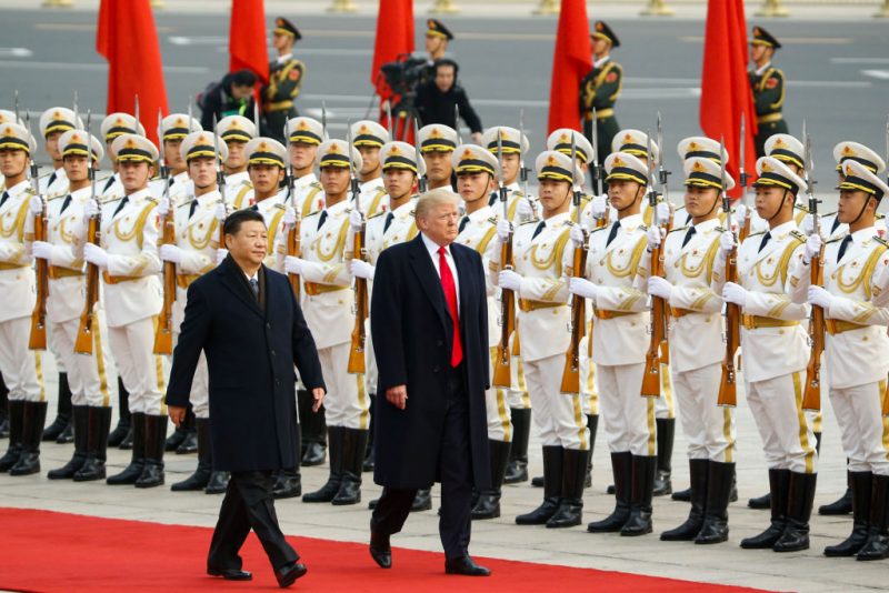 BEIJING, CHINA - NOVEMBER 9: U.S. President Donald Trump takes part in a welcoming ceremony with China's President Xi Jinping on November 9, 2017 in Beijing, China. Trump is on a 10-day trip to Asia. (Photo by Thomas Peter-Pool/Getty Images)