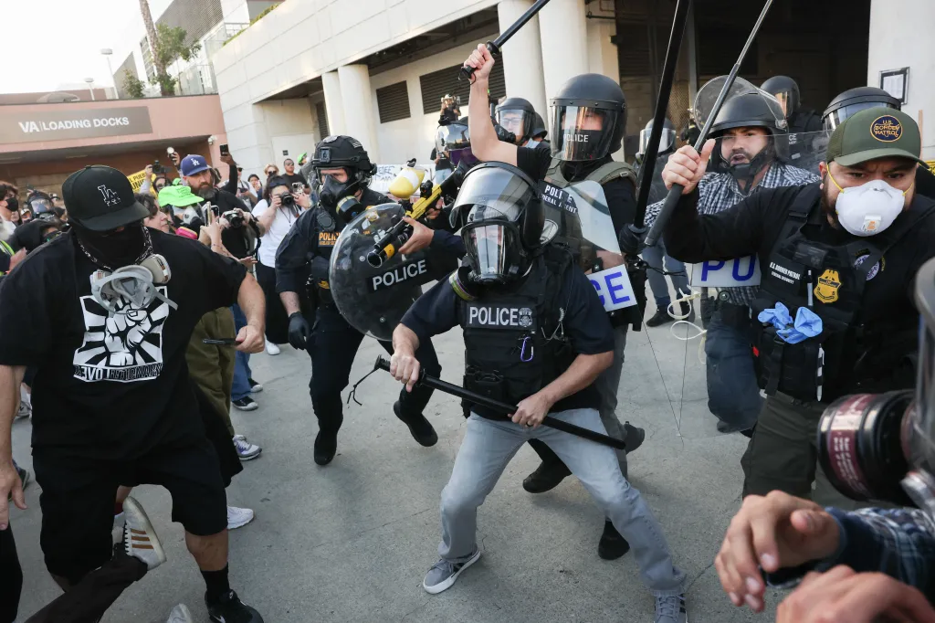 Protestors and police clashing during a "National Shutdown" protest against U.S. Immigration and Customs Enforcement.