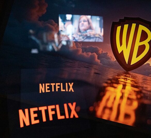 Multiple exposure photograph of the Netflix and Warner Bros logos in front of a television screen at Kerlouan in Brittany in France on December 05 2025. (Photo by Vincent Feuray / Hans Lucas / AFP via Getty Images)