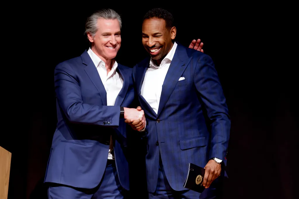 Mandatory Credit: Photo by ERIK S LESSER/EPA/Shutterstock (16692428q) Democratic California Governor Gavin Newsom (L) with Atlanta Mayor Andre Dickens (R) during his 'Young Man in a Hurry: A Memoir of Discovery' book tour stop in Atlanta, Georgia, USA, 22 February 2026. The autobiographical book will be released 24 February 2026. Gavin Newsom promotes 'Young Man in a Hurry: A Memoir of Discovery' book in Georgia, Atlanta, USA - 22 Feb 2026