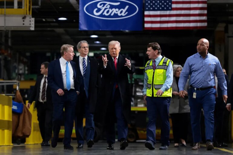 Donald Trump speaks with Bill Ford, Scott Bessent, Jim Farley, and Corey Williams at a Ford production center.