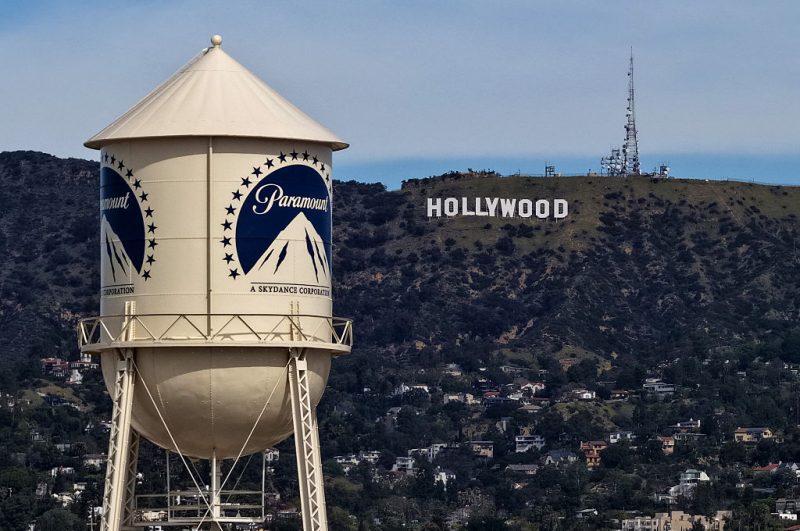 LOS ANGELES, CALIFORNIA - FEBRUARY 23: An aerial view of the Paramount logo on the water tower at Paramount Studios on February 23, 2026 in Los Angeles, California. Paramount Skydance is poised to increase its takeover offer for Warner Bros. Discovery above Netflix’s current bid, setting up a high-stakes bidding war that could see Netflix walk away from the deal if outbid. (Photo by Justin Sullivan/Getty Images)