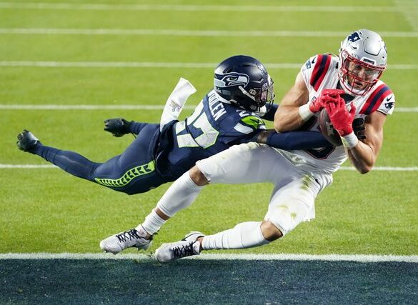POLITICS: Patriots’ star wide receiver wears mask, handcuffs in Super