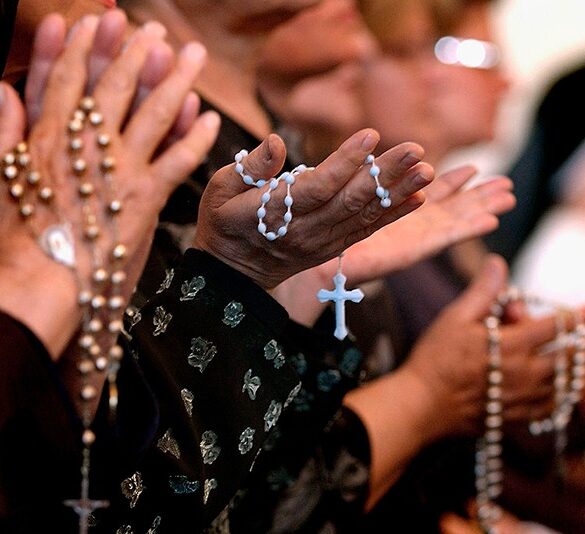 BAGHDAD, IRAQ - APRIL 7: Worshippers pray at a service for Pope John Paul II on April, 7, 2005 at a Catholic church in Baghdad, Iraq. Pope John Paul II died at his residence in the Vatican on April 2, aged 84 years old. His funeral will be held in St. Peter's Square on Friday, April 8. Cardinals under the age of 80 will start the conclave on April 18, where a new Pope will be chosen. (Photo by Wathiq Khuzaie/Getty Images)