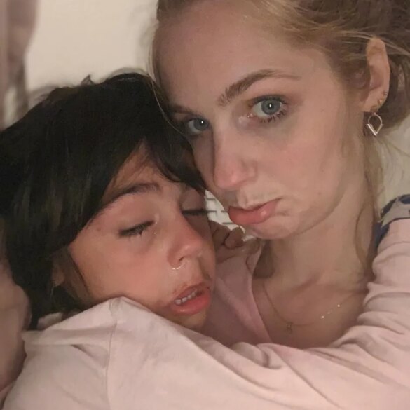 Talitha comforting Lanu-Skylar, who is crying.