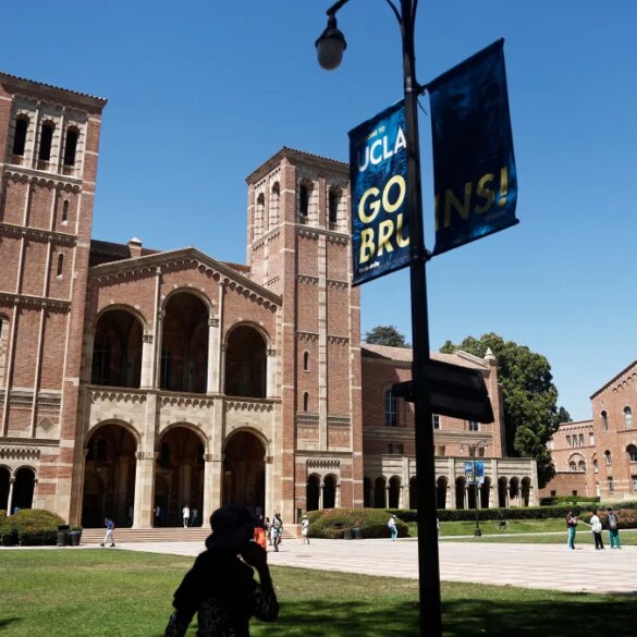 People walking on the plaza outside Royce Hall on the UCLA campus.