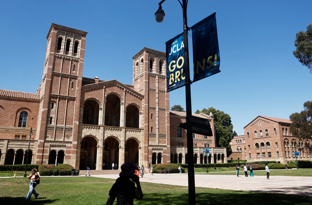 People walking on the plaza outside Royce Hall on the UCLA campus.