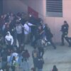 Federal police and students in downtown Los Angeles.